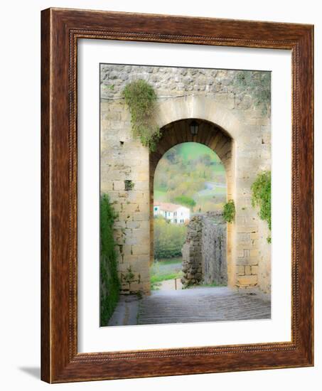 Italy, Chianti, Monteriggioni. Looking out an arched entrance into the walled town.-Julie Eggers-Framed Photographic Print