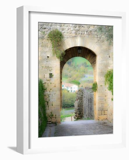 Italy, Chianti, Monteriggioni. Looking out an arched entrance into the walled town.-Julie Eggers-Framed Photographic Print