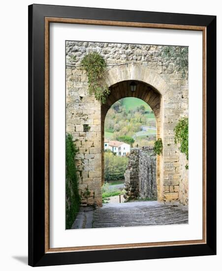 Italy, Chianti, Monteriggioni. Looking out an arched entrance into the walled town.-Julie Eggers-Framed Photographic Print