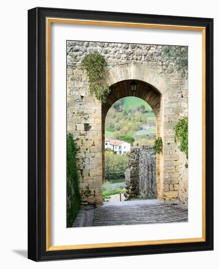 Italy, Chianti, Monteriggioni. Looking out an arched entrance into the walled town.-Julie Eggers-Framed Photographic Print