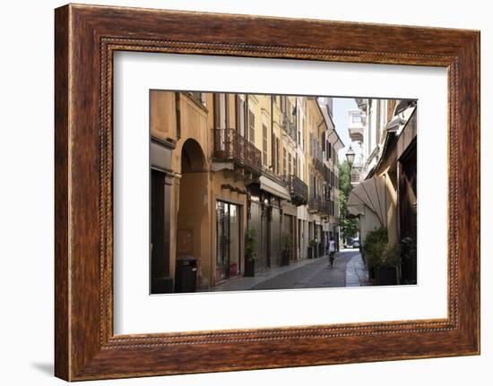 Italy, Lombardy, Cremona, cobblestone street with bicycles and old buildings-Alan Klehr-Framed Photographic Print