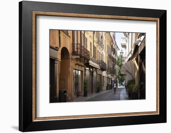 Italy, Lombardy, Cremona, cobblestone street with bicycles and old buildings-Alan Klehr-Framed Photographic Print