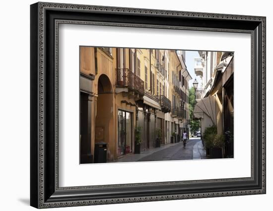 Italy, Lombardy, Cremona, cobblestone street with bicycles and old buildings-Alan Klehr-Framed Photographic Print