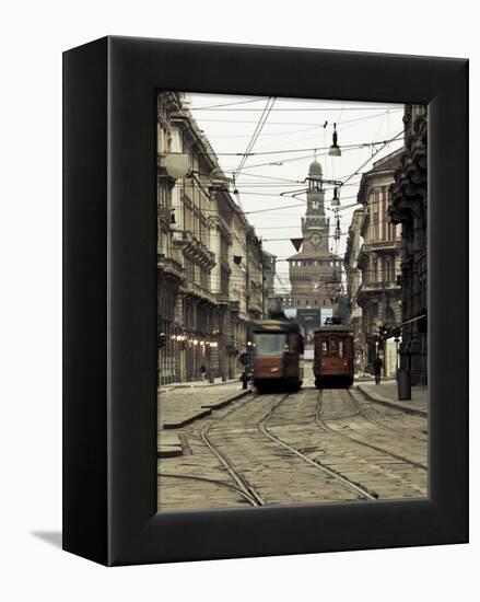 Italy, Lombardy, Milan, Milan Trams on Via Orefici with Castello Sforzesco, Dawn-Walter Bibikow-Framed Premier Image Canvas