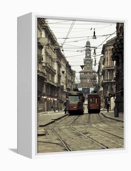 Italy, Lombardy, Milan, Milan Trams on Via Orefici with Castello Sforzesco, Dawn-Walter Bibikow-Framed Premier Image Canvas