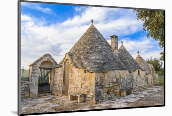 Italy, Region of Apulia, Province of Bari, Itria Valley, Alberobello. A trullo house-Emily Wilson-Mounted Photographic Print