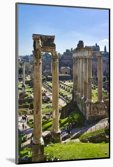 Italy, Rome, temple and arch ruins at Roman Forum-Michele Molinari-Mounted Photographic Print