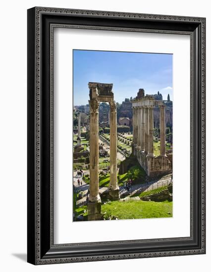 Italy, Rome, temple and arch ruins at Roman Forum-Michele Molinari-Framed Photographic Print