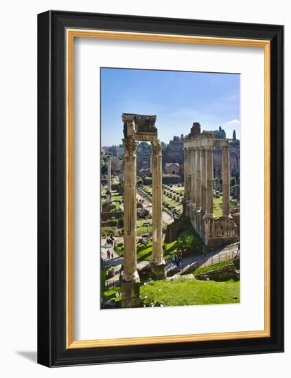 Italy, Rome, temple and arch ruins at Roman Forum-Michele Molinari-Framed Photographic Print