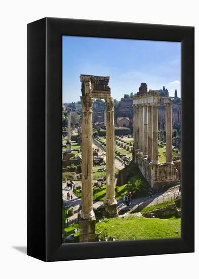 Italy, Rome, temple and arch ruins at Roman Forum-Michele Molinari-Framed Premier Image Canvas