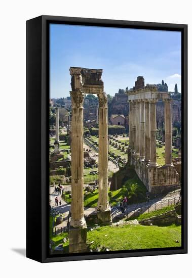 Italy, Rome, temple and arch ruins at Roman Forum-Michele Molinari-Framed Premier Image Canvas