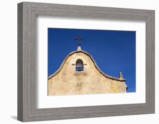 Italy, Sardinia, Gavoi. the Bell and Cross of an Old Church, Backed by a Blue Sky-Alida Latham-Framed Photographic Print