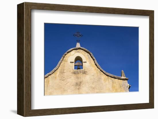 Italy, Sardinia, Gavoi. the Bell and Cross of an Old Church, Backed by a Blue Sky-Alida Latham-Framed Photographic Print