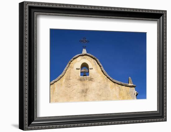 Italy, Sardinia, Gavoi. the Bell and Cross of an Old Church, Backed by a Blue Sky-Alida Latham-Framed Photographic Print