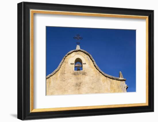 Italy, Sardinia, Gavoi. the Bell and Cross of an Old Church, Backed by a Blue Sky-Alida Latham-Framed Photographic Print