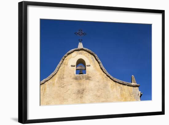 Italy, Sardinia, Gavoi. the Bell and Cross of an Old Church, Backed by a Blue Sky-Alida Latham-Framed Photographic Print