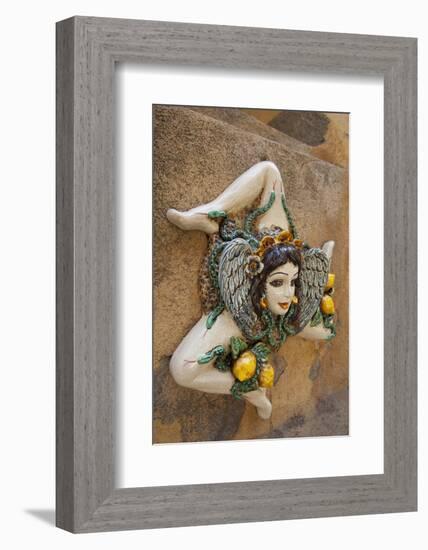 Italy, Sicily, Taormina, ceramic woman with lemons on wall.-Merrill Images-Framed Photographic Print