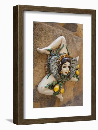 Italy, Sicily, Taormina, ceramic woman with lemons on wall.-Merrill Images-Framed Photographic Print