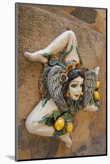 Italy, Sicily, Taormina, ceramic woman with lemons on wall.-Merrill Images-Mounted Photographic Print