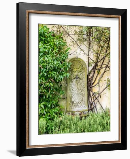 Italy, Tuscany. Carved stone with water spigot.-Julie Eggers-Framed Photographic Print