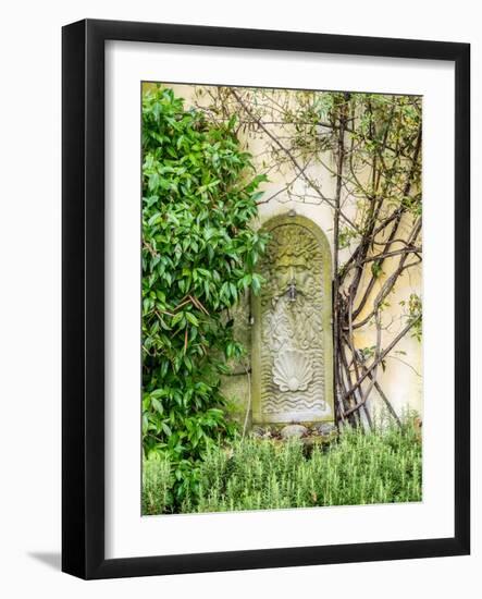 Italy, Tuscany. Carved stone with water spigot.-Julie Eggers-Framed Photographic Print