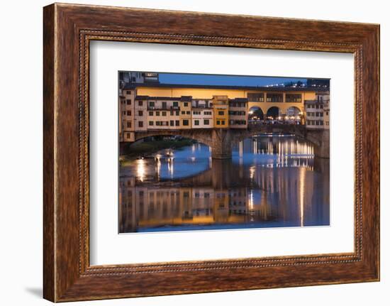 Italy, Tuscany, Florence, Ponte Vecchio reflected in Arno River at dusk.-Merrill Images-Framed Photographic Print