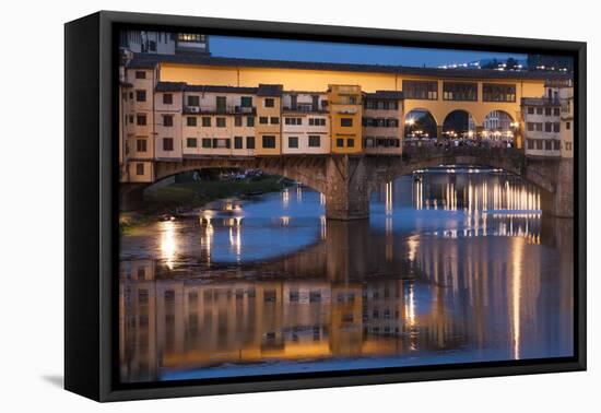 Italy, Tuscany, Florence, Ponte Vecchio reflected in Arno River at dusk.-Merrill Images-Framed Premier Image Canvas