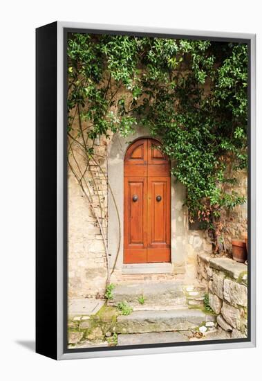 Italy, Tuscany, Greve in Chianti. Chianti vineyards. Stone farm house entrance door.-Emily Wilson-Framed Premier Image Canvas