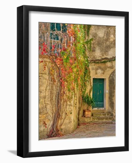 Italy, Tuscany, Monticchiello. Red ivy covering the walls of the buildings.-Julie Eggers-Framed Photographic Print