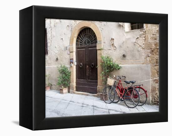 Italy, Tuscany, Pienza. Bicycles Parked Along the Streets of Pienza-Julie Eggers-Framed Premier Image Canvas