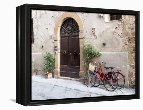 Italy, Tuscany, Pienza. Bicycles Parked Along the Streets of Pienza-Julie Eggers-Framed Premier Image Canvas