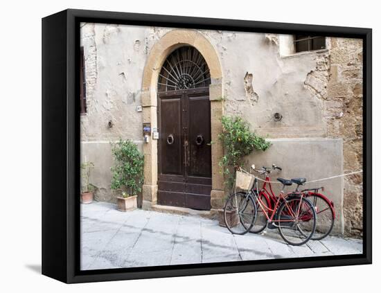 Italy, Tuscany, Pienza. Bicycles Parked Along the Streets of Pienza-Julie Eggers-Framed Premier Image Canvas