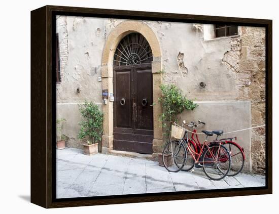 Italy, Tuscany, Pienza. Bicycles Parked Along the Streets of Pienza-Julie Eggers-Framed Premier Image Canvas