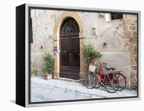 Italy, Tuscany, Pienza. Bicycles Parked Along the Streets of Pienza-Julie Eggers-Framed Premier Image Canvas
