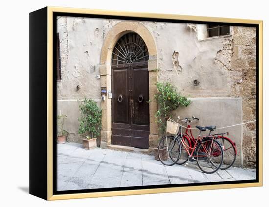 Italy, Tuscany, Pienza. Bicycles Parked Along the Streets of Pienza-Julie Eggers-Framed Premier Image Canvas