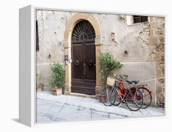 Italy, Tuscany, Pienza. Bicycles Parked Along the Streets of Pienza-Julie Eggers-Framed Premier Image Canvas