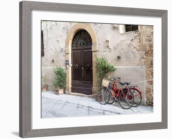 Italy, Tuscany, Pienza. Bicycles Parked Along the Streets of Pienza-Julie Eggers-Framed Photographic Print