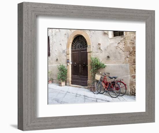 Italy, Tuscany, Pienza. Bicycles Parked Along the Streets of Pienza-Julie Eggers-Framed Photographic Print