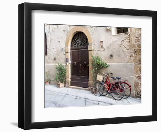 Italy, Tuscany, Pienza. Bicycles Parked Along the Streets of Pienza-Julie Eggers-Framed Photographic Print