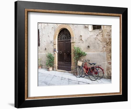 Italy, Tuscany, Pienza. Bicycles Parked Along the Streets of Pienza-Julie Eggers-Framed Photographic Print