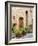 Italy, Tuscany, Pienza. Doorway surrounded by flowers.-Julie Eggers-Framed Photographic Print