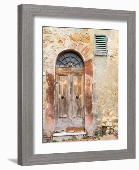 Italy, Tuscany, Pienza. Old wooden door along the streets.-Julie Eggers-Framed Photographic Print