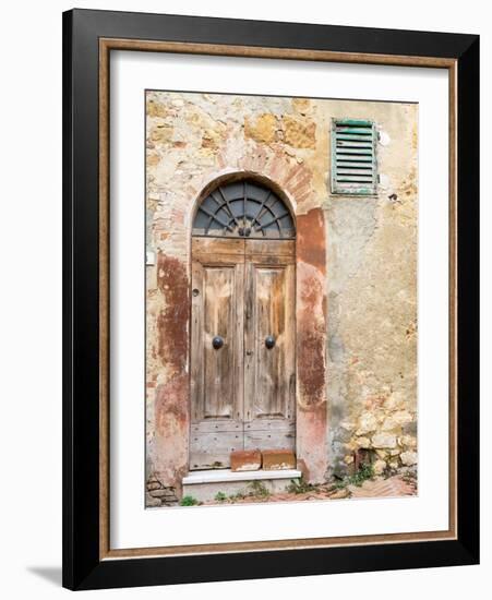 Italy, Tuscany, Pienza. Old wooden door along the streets.-Julie Eggers-Framed Photographic Print