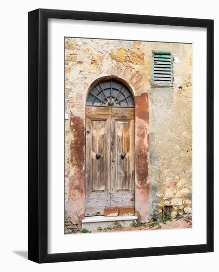 Italy, Tuscany, Pienza. Old wooden door along the streets.-Julie Eggers-Framed Photographic Print