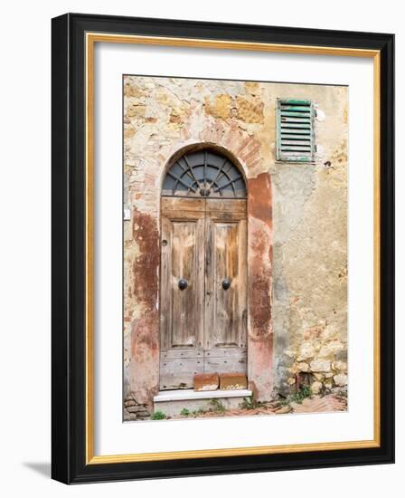 Italy, Tuscany, Pienza. Old wooden door along the streets.-Julie Eggers-Framed Photographic Print