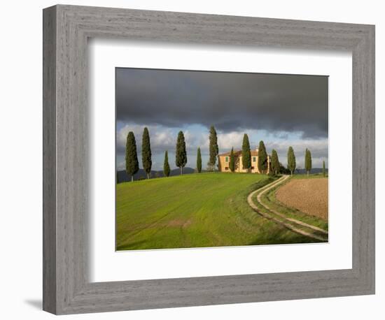 Italy, Tuscany, Pienza. Tuscan Farmhouse with Stormy Clouds-Julie Eggers-Framed Photographic Print