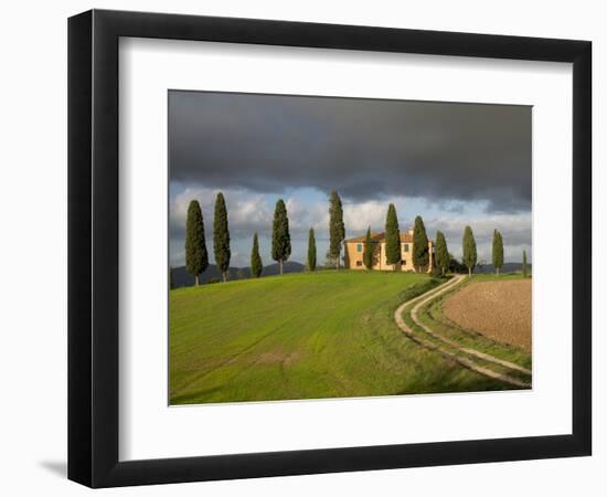 Italy, Tuscany, Pienza. Tuscan Farmhouse with Stormy Clouds-Julie Eggers-Framed Photographic Print