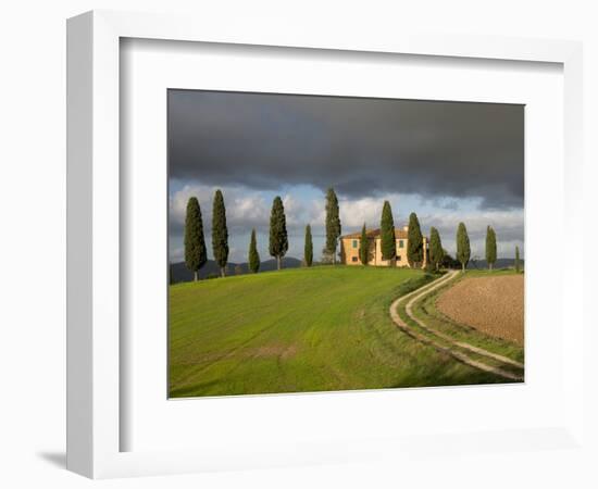 Italy, Tuscany, Pienza. Tuscan Farmhouse with Stormy Clouds-Julie Eggers-Framed Photographic Print
