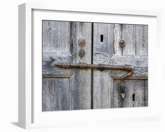 Italy, Tuscany. Unique metal door lock on an old wooden door.-Julie Eggers-Framed Photographic Print