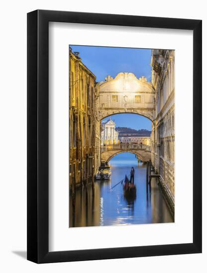 Italy, Veneto, Venice. Bridge of Sighs Illuminated at Dusk with Gondolas-Matteo Colombo-Framed Photographic Print